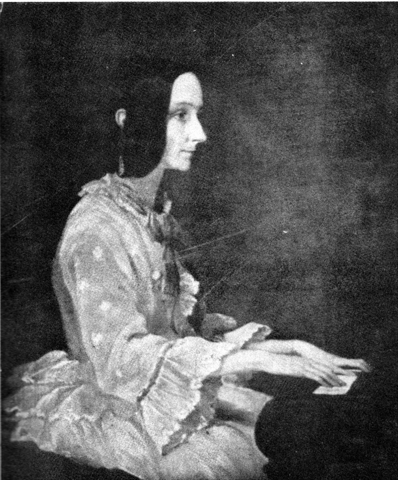 Painting of Ada Lovelace seated at a piano, with her hands on the keys.