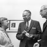 Dixy Lee Ray, Glenn Seaborg and Ed Westcott stand together at an event.