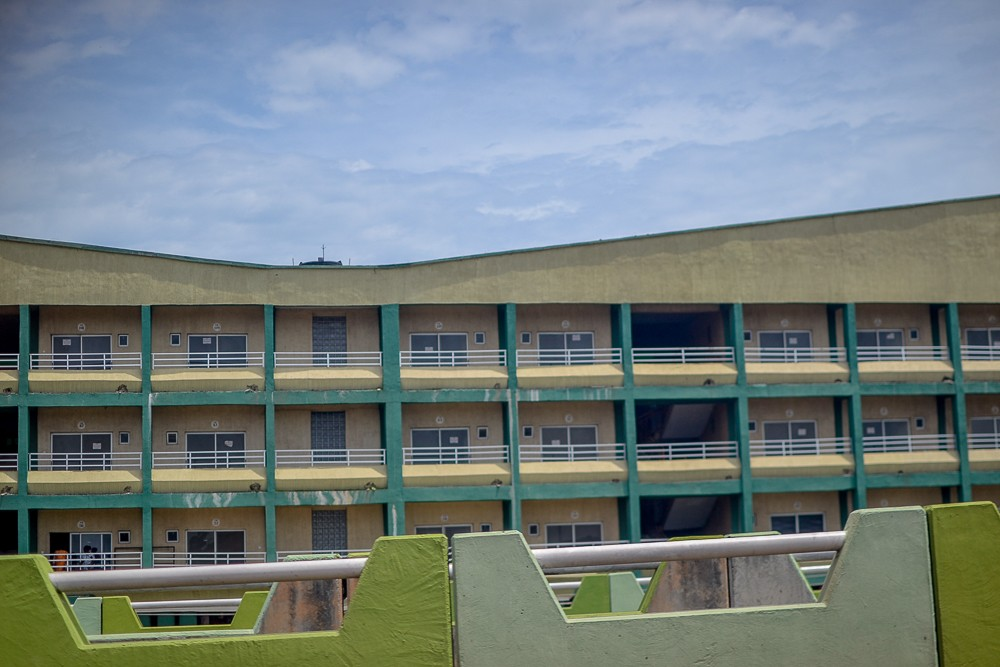 Itoku market block in Abeokuta in 2019 | Amazing Women In History A modern market building in Abeokuta, with three levels of shops and open walkways.