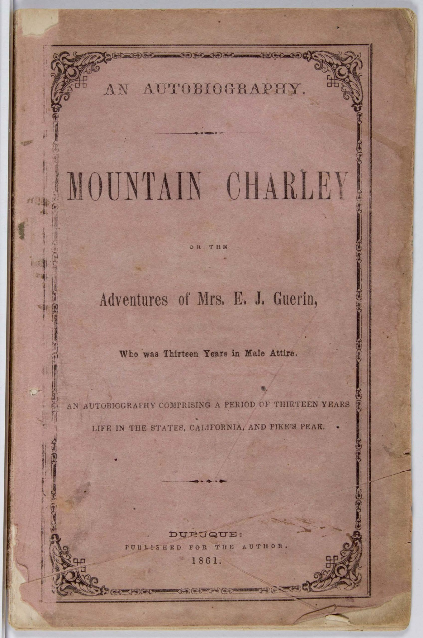 Pink paper cover of Elsa Jane Guerin's 1861 memoir Mountain Charley, with an ornamental border and printed title.