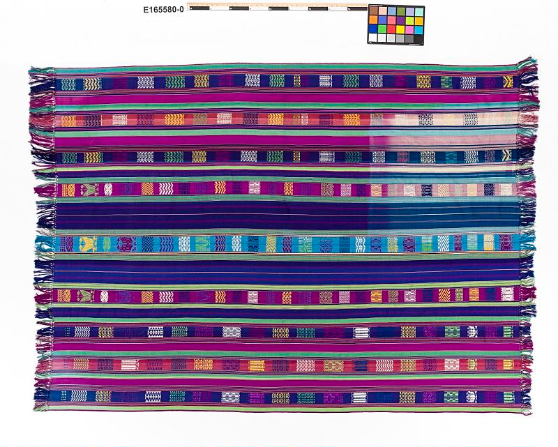 Ranavalona III’s multicolored silk gift to Grover Cleveland | Amazing Women In History A silk lamba with purple, green, and blue bands and geometric patterns, fringed at both sides.