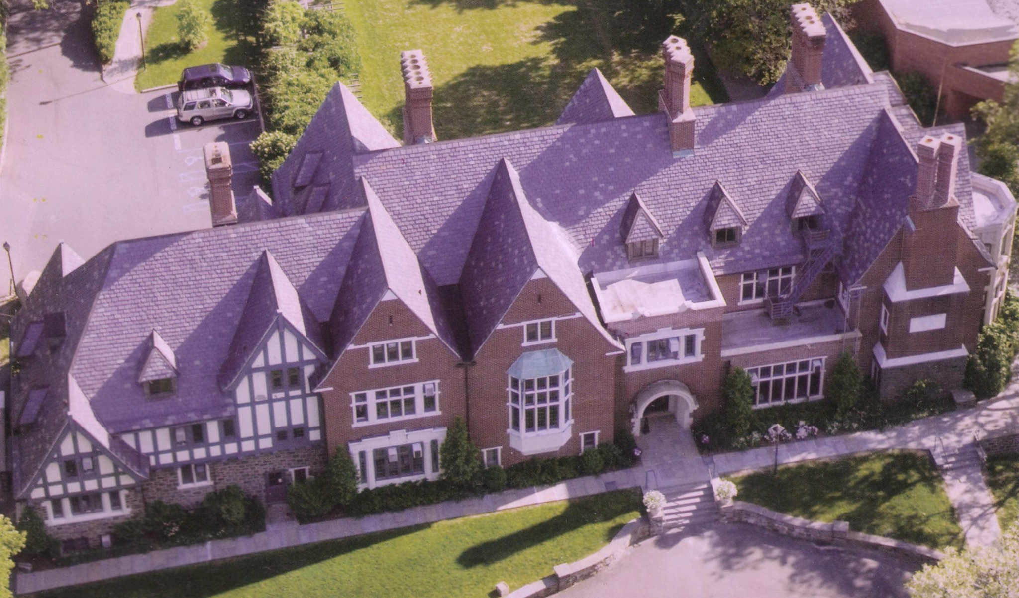 Westlands at Sarah Lawrence College, 2005 | Amazing Women In History Aerial photograph of Westlands at Sarah Lawrence College, showing its steep roofs, chimneys, paths, and lawn.