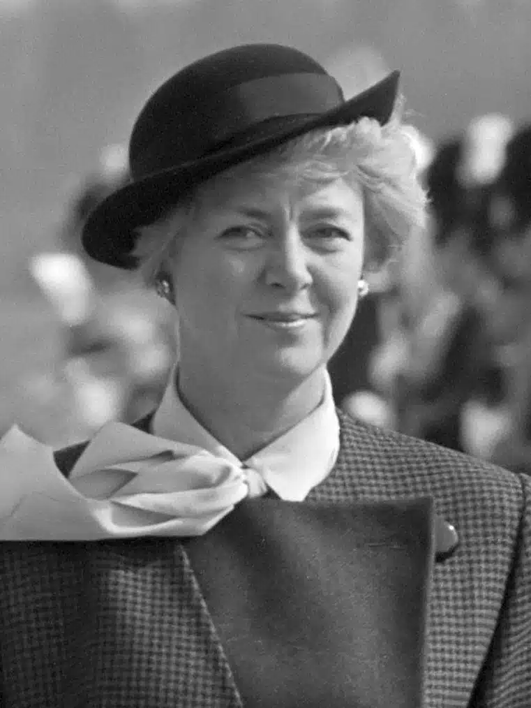 Vigdís Finnbogadóttir wearing a dark hat and scarf at a public event.